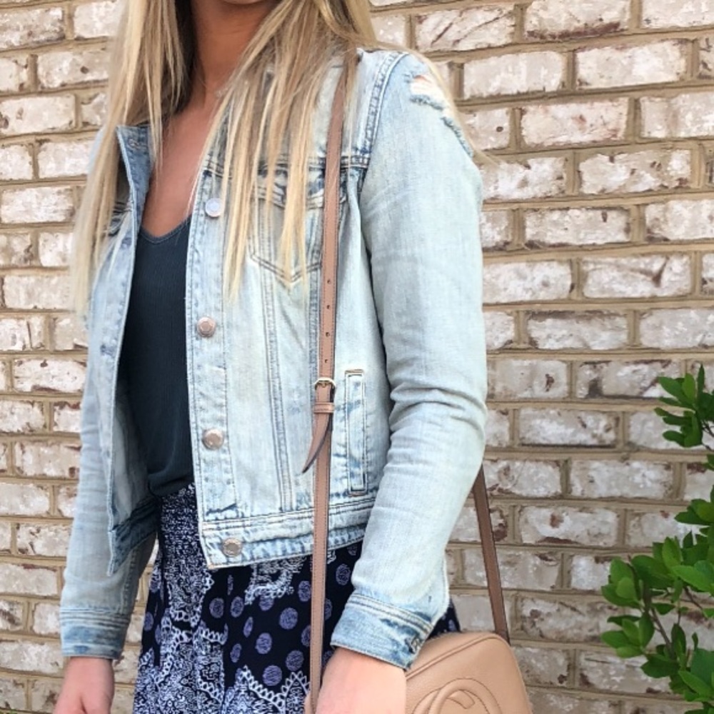 Distressed jean jacket